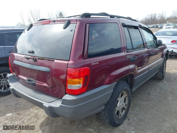 2001 Jeep Grand Cherokee Laredo with VIN 1J4GW48S51C739725, listed as a IAAI auction lot 41800431 with 220,396 mi miles. Bid and sale history available at carsss.com. Image 4.