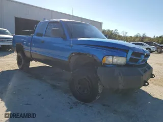 2000 Dodge Ram 1500 with VIN 3B7HF13Z9YG148639, listed as a Copart auction lot 87698355 with 273,328 mi miles and Salvage Title. Bid and sale history available at carsss.com. Image 4.