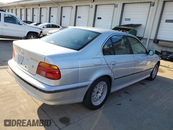 1999 BMW 5 Series 528iA with VIN WBADM6331XBY22302, listed as a Copart auction lot 43232585 with 196,519 mi miles and Clean Title. Bid and sale history available at carsss.com. Image 3.