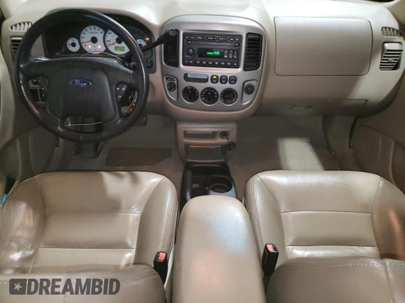 2004 Ford Escape Limited z VIN 1FMCU94124KA53894, wystawiony jako Copart lot #62788415 z przebiegiem 177 654 mil mil oraz Szkoda całkowita • Salvage title. Historia ofert i sprzedaży dostępna na DreamBid. Obrazek 8.