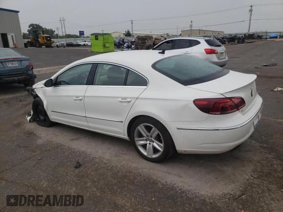 2015 Volkswagen CC R-Line with VIN WVWBN7AN0FE808583, listed as a Copart auction lot 67221683 with 54,048 mi miles. Bid and sale history available at carsss.com. Image 2.
