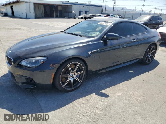 2015 BMW M6 z VIN WBSLX9C58FD160609, wystawiony jako Copart lot #56992535 z przebiegiem 52 324 mil mil oraz Tytuł czysty. Historia ofert i sprzedaży dostępna na DreamBid. Obrazek 1.