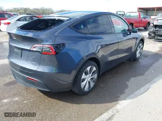 2023 Tesla Model Y Long Range with VIN 7SAYGDEE3PA204992, listed as a IAAI auction lot 41849104 with 22,490 mi miles. Bid and sale history available at carsss.com. Image 4.