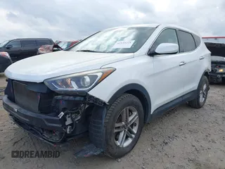 2018 Hyundai Santa Fe 2.4L z VIN 5NMZTDLB9JH060895, wystawiony jako IAAI lot #41939221 z przebiegiem 89 960 mil mil oraz . Historia ofert i sprzedaży dostępna na DreamBid. Obrazek 2.