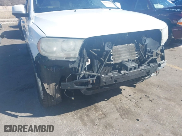 2013 Dodge Durango Special Service with VIN 1C4SDJFT8DC658044, listed as a IAAI auction lot 41871863 with 214,545 mi miles and . Bid and sale history available at carsss.com. Image 6.