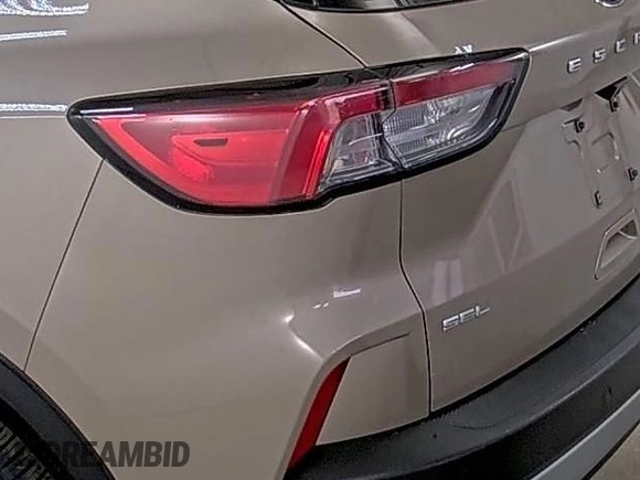 2021 Ford Escape SEL Hybrid with VIN 1FMCU9CZ6MUA54090, listed as a IAAI auction lot 42098029 with 71,208 mi miles and . Bid and sale history available at DreamBid. Image 1.