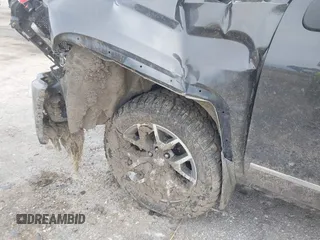 2015 GMC Sierra 1500 SLE z VIN 1GTV2UEC3FZ212843, wystawiony jako IAAI lot #42030130 z przebiegiem Nie podano mil oraz . Historia ofert i sprzedaży dostępna na DreamBid. Obrazek 6.