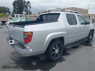 2006 Honda Ridgeline RTL with VIN 2HJYK16556H514349, listed as a IAAI auction lot 42076938 with 215,048 mi miles. Bid and sale history available at carsss.com. Image 4.