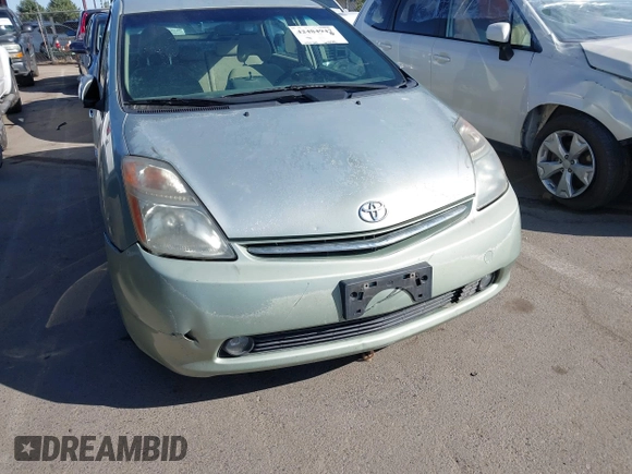 2007 Toyota Prius z VIN JTDKB20U973221624, wystawiony jako IAAI lot #42484947 z przebiegiem 257 311 mil mil oraz . Historia ofert i sprzedaży dostępna na DreamBid. Obrazek 16.