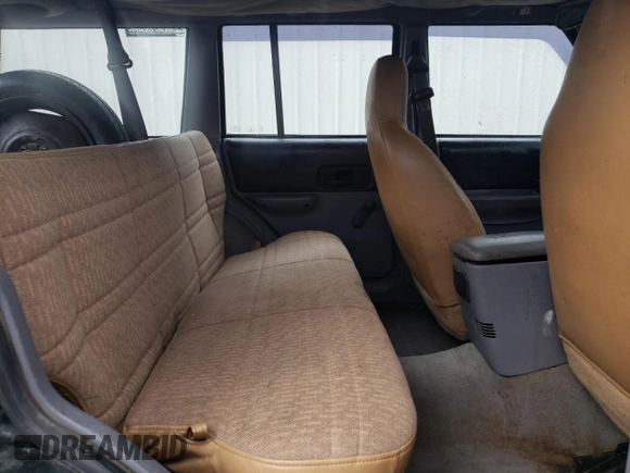 1997 Jeep Cherokee SE с VIN 1J4FJ28S5VL509588, выставлен на аукционе Copart как лот 56181695 с пробегом 313 430 миль миль и Списание • Salvage title. История ставок и продаж доступна на DreamBid. Изображение 11.