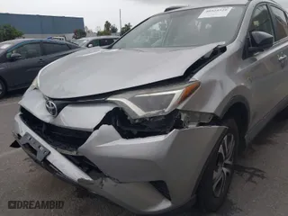 2016 Toyota RAV4 LE with VIN 2T3ZFREV6GW296324, listed as a IAAI auction lot 40922529 with 138,107 mi miles. Bid and sale history available at carsss.com. Image 6.