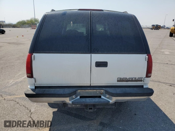 1994 Chevrolet Suburban z VIN 1GNGK26F1RJ444762, wystawiony jako Copart lot #86776674 z przebiegiem 354 375 mil mil oraz Szkoda całkowita • Salvage title. Historia ofert i sprzedaży dostępna na DreamBid. Obrazek 6.