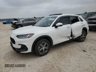2025 Honda HR-V EX-L z VIN 3CZRZ1H70SM715374, wystawiony jako Copart lot #51235815 z przebiegiem 5196 mil mil oraz Szkody całkowita. Historia ofert i sprzedaży dostępna na DreamBid. Obrazek 1.