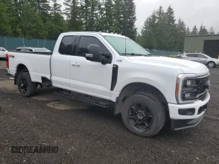2023 Ford F-250 with VIN 1FT8X2BN0PEC27558, listed as a Copart auction lot 68699574 with 34,777 mi miles and Salvage title. Bid and sale history available at DreamBid. Image 4.