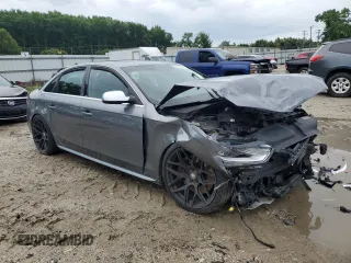 2014 Audi S4 Prestige with VIN WAUKGAFL6EA011546, listed as a Copart auction lot 64061974 with 128,034 mi miles and Salvage Title. Bid and sale history available at carsss.com. Image 4.