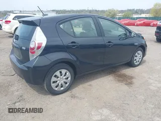 2014 Toyota Prius One with VIN JTDKDTB32E1074592, listed as a IAAI auction lot 42078851 with Not Provided miles and . Bid and sale history available at DreamBid. Image 4.