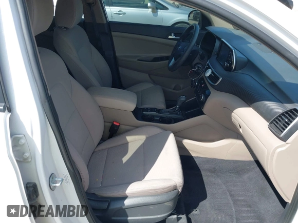 2019 Hyundai Tucson SE with VIN KM8J2CA43KU870933, listed as a IAAI auction lot 41972884 with 53,029 mi miles. Bid and sale history available at carsss.com. Image 5.