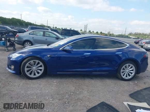 2017 Tesla Model S 100D with VIN 5YJSA1E28HF217489, listed as a IAAI auction lot 42128388 with Not provided miles and . Bid and sale history available at DreamBid. Image 15.