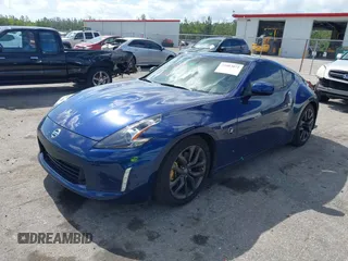 2020 Nissan 370Z z VIN JN1AZ4EH9LM822893, wystawiony jako IAAI lot #42083072 z przebiegiem 39 373 mil mil oraz . Historia ofert i sprzedaży dostępna na DreamBid. Obrazek 2.