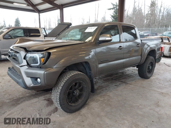 2013 Toyota Tacoma z VIN 3TMLU4EN9DM124980, wystawiony jako IAAI lot #41576747 z przebiegiem 209 883 mil mil oraz . Historia ofert i sprzedaży dostępna na DreamBid. Obrazek 17.