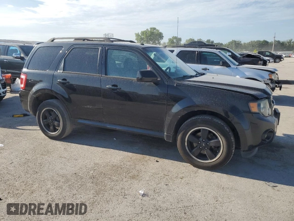 2011 Ford Escape XLT с VIN 1FMCU9DG5BKB65171, выставлен на аукционе Copart как лот 63237785 с пробегом 195 141 миль миль и Списание • Salvage title. История ставок и продаж доступна на DreamBid. Изображение 4.