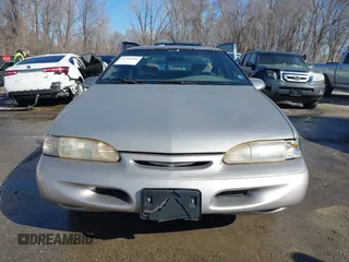 1995 Ford Thunderbird LX with VIN 1FALP62W9SH206490, listed as a IAAI auction lot 41744430 with 111,365 mi miles. Bid and sale history available at carsss.com. Image 12.