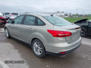 2016 Ford Focus SE z VIN 1FADP3F26GL332224, wystawiony jako IAAI lot #42167222 z przebiegiem 134 423 mil mil oraz . Historia ofert i sprzedaży dostępna na DreamBid. Obrazek 3.