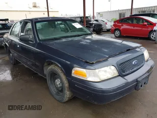 2001 Ford Crown Victoria Police Police Interceptor with VIN 2FAFP71WX1X127347, listed as a IAAI auction lot 41134745 with 161,180 mi miles. Bid and sale history available at carsss.com. Image 1.