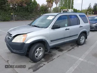 2002 Honda CR-V LX with VIN JHLRD68422C008983, listed as a IAAI auction lot 42112835 with 198,114 mi miles and . Bid and sale history available at carsss.com. Image 2.