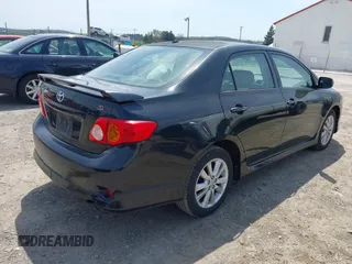 2009 Toyota Corolla with VIN 1NXBU40E29Z085117, listed as a IAAI auction lot 42059893 with 199,576 mi miles. Bid and sale history available at carsss.com. Image 4.