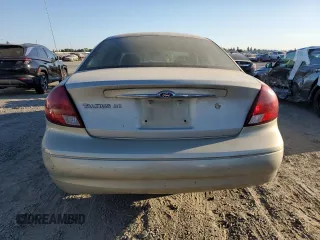 2003 Ford Taurus SE Standard with VIN 1FAFP53U13G188188, listed as a Copart auction lot 73574624 with 95,017 mi miles and Salvage Title. Bid and sale history available at DreamBid. Image 6.