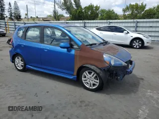 2007 Honda Fit Sport with VIN JHMGD38687S014318, listed as a Copart auction lot 53992935 with 59,504 mi miles and Clean title. Bid and sale history available at DreamBid. Image 4.