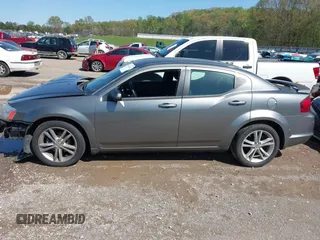 2013 Dodge Avenger SXT with VIN 1C3CDZCG7DN585431, listed as a IAAI auction lot 41975228 with 152,703 mi miles and . Bid and sale history available at carsss.com. Image 14.
