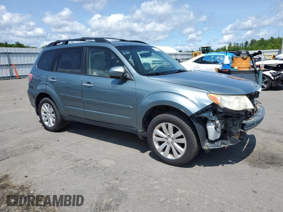 2012 Subaru Forester X Premium with VIN JF2SHADC2CH425710, listed as a Copart auction lot 58786535 with 100,424 mi miles and Salvage title. Bid and sale history available at DreamBid. Image 4.