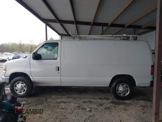 2009 Ford Econoline Cargo with VIN 1FTNE24W99DA34042, listed as a IAAI auction lot 41964410 with 284,031 mi miles and . Bid and sale history available at DreamBid. Image 14.