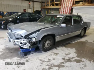1991 Cadillac DeVille z VIN 1G6CD53B1M4210345, wystawiony jako Copart lot #87639005 z przebiegiem 134 990 mil mil oraz Szkoda całkowita • Salvage title. Historia ofert i sprzedaży dostępna na DreamBid. Obrazek 1.