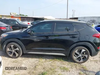 2018 Hyundai Tucson Sport z VIN KM8J33AL5JU741563, wystawiony jako IAAI lot #41928357 z przebiegiem 97 004 mil mil oraz . Historia ofert i sprzedaży dostępna na DreamBid. Obrazek 14.