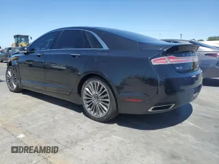 2013 Lincoln MKZ Hybrid with VIN 3LN6L2LU1DR808323, listed as a Copart auction lot 58077725 with 128,837 mi miles and Salvage title. Bid and sale history available at DreamBid. Image 2.
