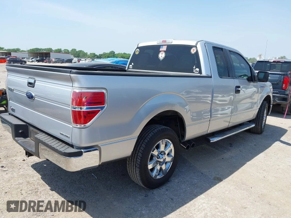 2014 Ford F-150 XL with VIN 1FTFX1CF8EFB98133, listed as a IAAI auction lot 42007052 with 70,530 mi miles and . Bid and sale history available at DreamBid. Image 4.