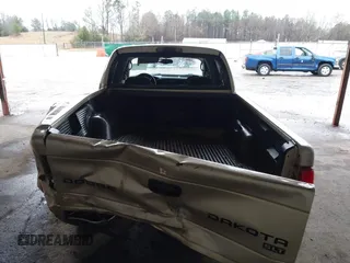 2003 Dodge Dakota SLT with VIN 1D7HL48N93S303911, listed as a IAAI auction lot 41536555 with 383,306 mi miles. Bid and sale history available at carsss.com. Image 17.