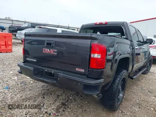 2015 GMC Sierra 1500 SLT with VIN 3GTU2VEC8FG406902, listed as a IAAI auction lot 42073788 with 203,919 mi miles and . Bid and sale history available at DreamBid. Image 4.