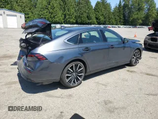2024 Honda Accord Touring with VIN 1HGCY2F87RA005817, listed as a Copart auction lot 59211165 with 28,355 mi miles and Salvage title. Bid and sale history available at DreamBid. Image 3.