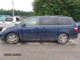 2005 Honda Odyssey EX-L with VIN 5FNRL38725B001662, listed as a IAAI auction lot 42693301 with 161,114 mi miles and . Bid and sale history available at DreamBid. Image 12.