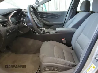 2015 Chevrolet Impala LS z VIN 2G11Z5SL6F9191851, wystawiony jako Copart lot #56943765 z przebiegiem 107 297 mil mil oraz Nie do naprawy • Non repairable. Historia ofert i sprzedaży dostępna na DreamBid. Obrazek 7.