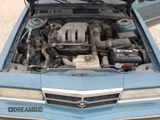 1993 Dodge Dynasty LE z VIN 1B3XC56R3PD124521, wystawiony jako Copart lot #51825725 z przebiegiem 94 336 mil mil oraz Szkoda całkowita • Salvage title. Historia ofert i sprzedaży dostępna na DreamBid. Obrazek 12.