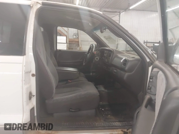 1999 Dodge Dakota SLT with VIN 1B7GG22XXXS254782, listed as a IAAI auction lot 41847644 with 164,607 mi miles and . Bid and sale history available at carsss.com. Image 5.