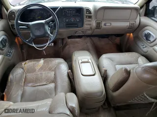 1999 Chevrolet Suburban with VIN 3GNEC16RXXG260623, listed as a Copart auction lot 54609694 with 246,460 mi miles and Salvage Title. Bid and sale history available at carsss.com. Image 8.