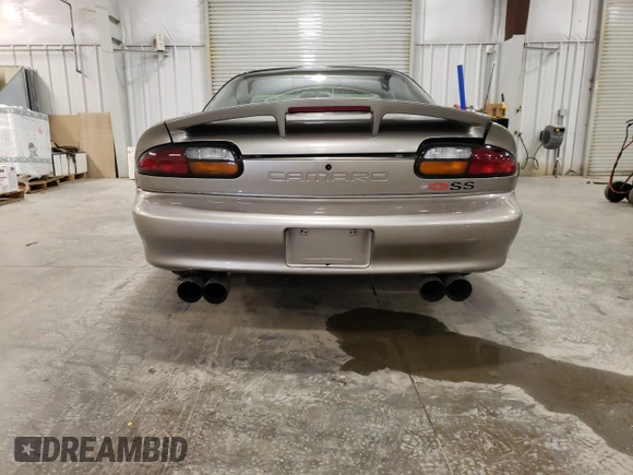 2001 Chevrolet Camaro Z28 z VIN 2G1FP22GX12112874, wystawiony jako Copart lot #70669594 z przebiegiem 58 773 mil mil oraz Szkoda całkowita • Salvage title. Historia ofert i sprzedaży dostępna na DreamBid. Obrazek 6.