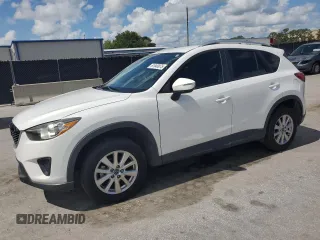 2015 Mazda CX-5 Sport with VIN JM3KE2BE6F0546994, listed as a Copart auction lot 61948075 with 111,845 mi miles and Clean title. Bid and sale history available at DreamBid. Image 1.