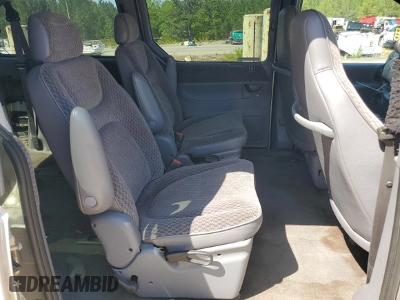 2000 Dodge Caravan SE z VIN 1B4GP44G7YB734074, wystawiony jako Copart lot #52830095 z przebiegiem Nie podano mil oraz Szkoda całkowita • Salvage title. Historia ofert i sprzedaży dostępna na DreamBid. Obrazek 11.